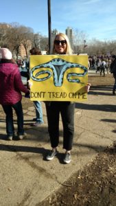 Sign "Don't Tread on Me" with uterus and fallopian tubes as snake
